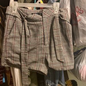 Grey plaid shorts with matching tie belt